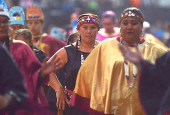 Native Women Dressed in Traditional Clothing
